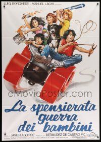 8j577 CHILDREN'S WAR Italian 1p '80 great Sciotti art of Spanish kids on giant roller skate!
