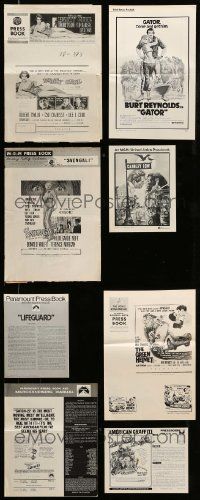 9a242 LOT OF 12 UNCUT PRESSBOOKS '50s-80s advertising images from a variety of different movies!