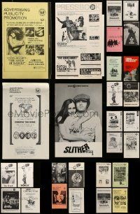 9a228 LOT OF 28 UNCUT PRESSBOOKS '60s-70s advertising images from a variety of different movies!