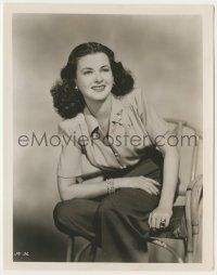 9m424 JOAN BENNETT 8x10.25 still '47 smiling portrait sitting on chair from Woman on the Beach!