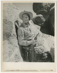 9m562 NEVADAN 8x10.25 still '50 Randolph Scott with gun drawn hiding behind huge boulder!