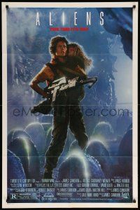9p034 ALIENS 1sh '86 James Cameron, Sigourney Weaver as Ripley holding Carrie Henn!