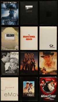 9x125 LOT OF 12 PRESSKITS '93 - '01 containing a total of 81 movie stills in all!