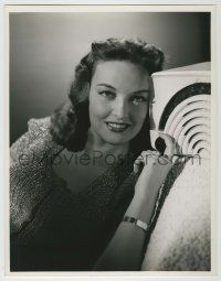 1d225 KARIN BOOTH deluxe 10.25x13 still '47 smiling c/u with old fashioned radio, Unfinished Dance!