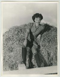 1d237 LARAINE DAY deluxe 10.25x13 still '45 smiling & sitting in haystack by Clarence Sinclair Bull