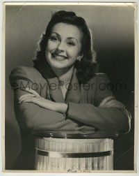 1d313 NANCY KELLY 11.25x14 still '40 smiling portrait of the pretty actress leaning on pedestal!