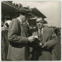 1d331 RAOUL WALSH 9.5x9.5 still '66 the great director lighting cigarette at Paris racetrack!