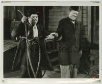 1s951 WAY OUT WEST 8.25x10 still R40s Stan Laurel closes eyes as Oliver Hardy hands him a rope!