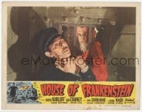 1y053 HOUSE OF FRANKENSTEIN LC #5 R50 Boris Karloff choking Charles Wagenheim through bars!