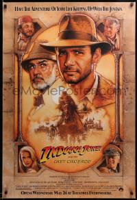 2g705 INDIANA JONES & THE LAST CRUSADE advance 1sh '89 Ford/Connery over a brown background by Drew