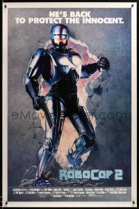 2g865 ROBOCOP 2 int'l 1sh '90 full-length cyborg policeman Peter Weller busts through wall, sequel!