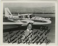 2j0618 ROBERT CUMMINGS signed 8x10 still '66 great smiling portrait by airplane w/long inscription!