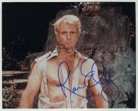 2j1313 RON ELY signed color 8x10 REPRO still '00s great close up in torn shirt as Doc Savage!