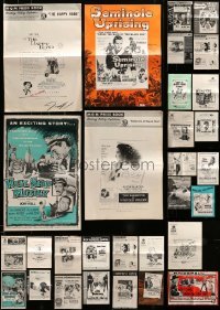 2m453 LOT OF 38 UNCUT PRESSBOOKS '50s-70s advertising images for a variety of different movies!