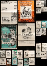 2m460 LOT OF 28 UNCUT PRESSBOOKS '50s-70s advertising images from a variety of different movies!