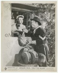 2w728 ONLY THE VALIANT 8x10.25 still '51 Ward Bond gets his canteen filled by pretty barmaid!