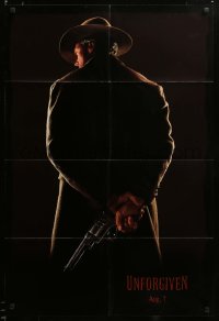 2z820 UNFORGIVEN teaser 1sh '92 image of gunslinger Clint Eastwood w/back turned, dated design!