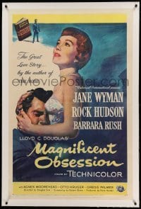 3a332 MAGNIFICENT OBSESSION linen 1sh '54 Besser art of Jane Wyman holding Rock Hudson, Douglas Sirk
