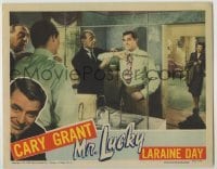 3c548 MR. LUCKY LC '43 Laraine Day watches dapper gambler Cary Grant get dressed!