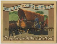 3c684 THEY DIED WITH THEIR BOOTS ON LC '41 Errol Flynn by Olivia De Havilland in covered wagon!