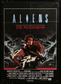 4r156 ALIENS German '86 James Cameron, close up of Sigourney Weaver carrying Carrie Henn!