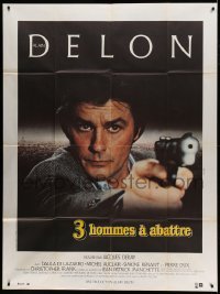5k936 THREE MEN TO DESTROY French 1p '80 cool super close image of Alain Delon pointing gun!