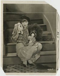 5s393 IT 8x10 still '27 wonderful close up of Clara Bow holding stuffed animal & doll on stairs!