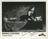 5y314 BRINKE STEVENS signed 8x10 publicity still '90s sexy on coffin starring in Creature Feature!