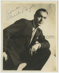 5y316 CHARLES BOYER signed deluxe 8x10 still '30s smoking portrait in suit & tie leaning on knee!