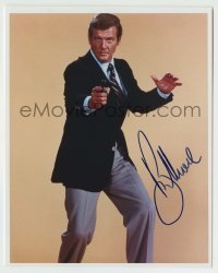 5y684 ROGER MOORE signed color 8x10 REPRO still '80s great portrait as James Bond 007 pointing gun!