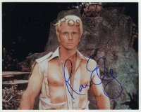 5y686 RON ELY signed color 8x10 REPRO still '00s great close up in torn shirt as Doc Savage!