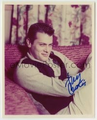 5y706 TONY CURTIS signed color 8x10 REPRO still '00 great full-length portrait seated on couch!
