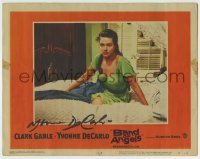 5y082 BAND OF ANGELS signed LC #8 '57 by Yvonne De Carlo, who is close up sitting on bed!
