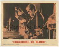 6c525 CORRIDORS OF BLOOD LC #8 '63 Boris Karloff in laboratory experimenting with the new drug!