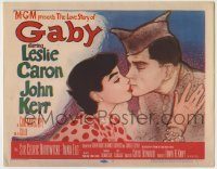 6c187 GABY TC '56 wonderful close up art of soldier John Kerr kissing Leslie Caron!