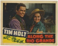 7c032 ALONG THE RIO GRANDE LC 1941 great close up of Tim Holt & pretty Betty Jane Rhodes smiling!