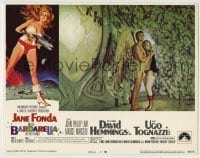 7c057 BARBARELLA LC #4 1968 winged John Phillip Law holds sexy Jane Fonda in cool cavern!