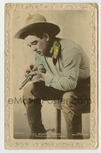 7d249 WILLIAM DUNCAN #209B English 4x6 postcard 1920s c/u of the cowboy actor loading his gun!