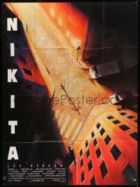 7g846 LA FEMME NIKITA French 1p 1990 Luc Besson, cool overhead art of Anne Parillaud in alley!