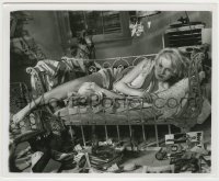 7h207 BABY DOLL 8.25x10 still 1957 classic image of sexy troubled teen Carroll Baker laying on bed