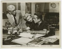 7h500 IN A LONELY PLACE 8x10.25 still 1950 Gloria Grahame hugs Humphrey Bogart sitting at desk!