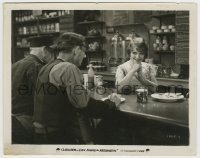 7h599 LOVE AMONG THE MILLIONAIRES 8x10.25 still 1930 Clara Bow smiles at man across counter in diner