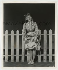 7h643 MEET ME IN ST. LOUIS 8.25x10 still 1944 Judy Garland hiking up her skirt by picket fence!