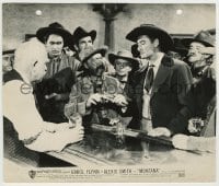 7h659 MONTANA 7.75x9.25 still 1950 cowboy holds Errol Flynn's gun while he gets a drink at the bar!