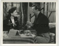 7h760 REUNION IN FRANCE deluxe 8x10 still 1942 Joan Crawford makes meager breakfast for John Wayne!