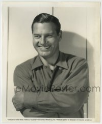 7h766 RICHARD ARLEN 8x10 still 1940 smiling portrait in casual shirt working for Universal!