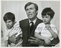 7h979 WITCHES 7.75x10 still 1967 young worried Clint Eastwood in tie & jacket holding two kids!