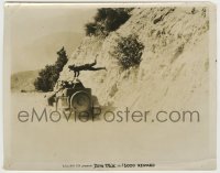 8a035 DAREDEVIL'S REWARD 8x10 still 1928 great image of Tom Mix leaping from cliff onto moving car!