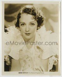 8a095 BEBE DANIELS 8x10.25 still 1933 great close portrait wearing a wild feathered outfit!