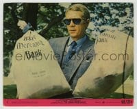 8a033 THOMAS CROWN AFFAIR 8x10 mini LC #1 1968 great close up of Steve McQueen with bank bags!